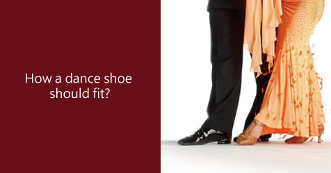 When preparing to buy dance shoes, how should they fit?